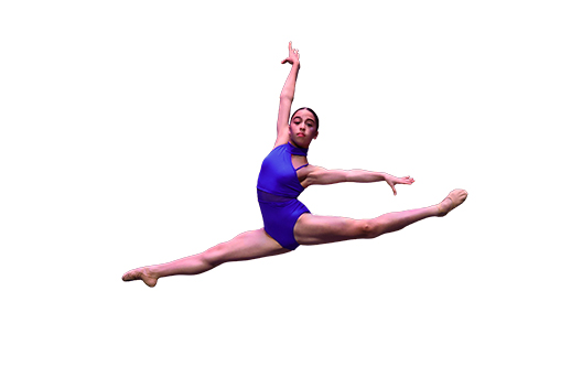 Ballet dancer in blue leotard jumps in air with arms extended
